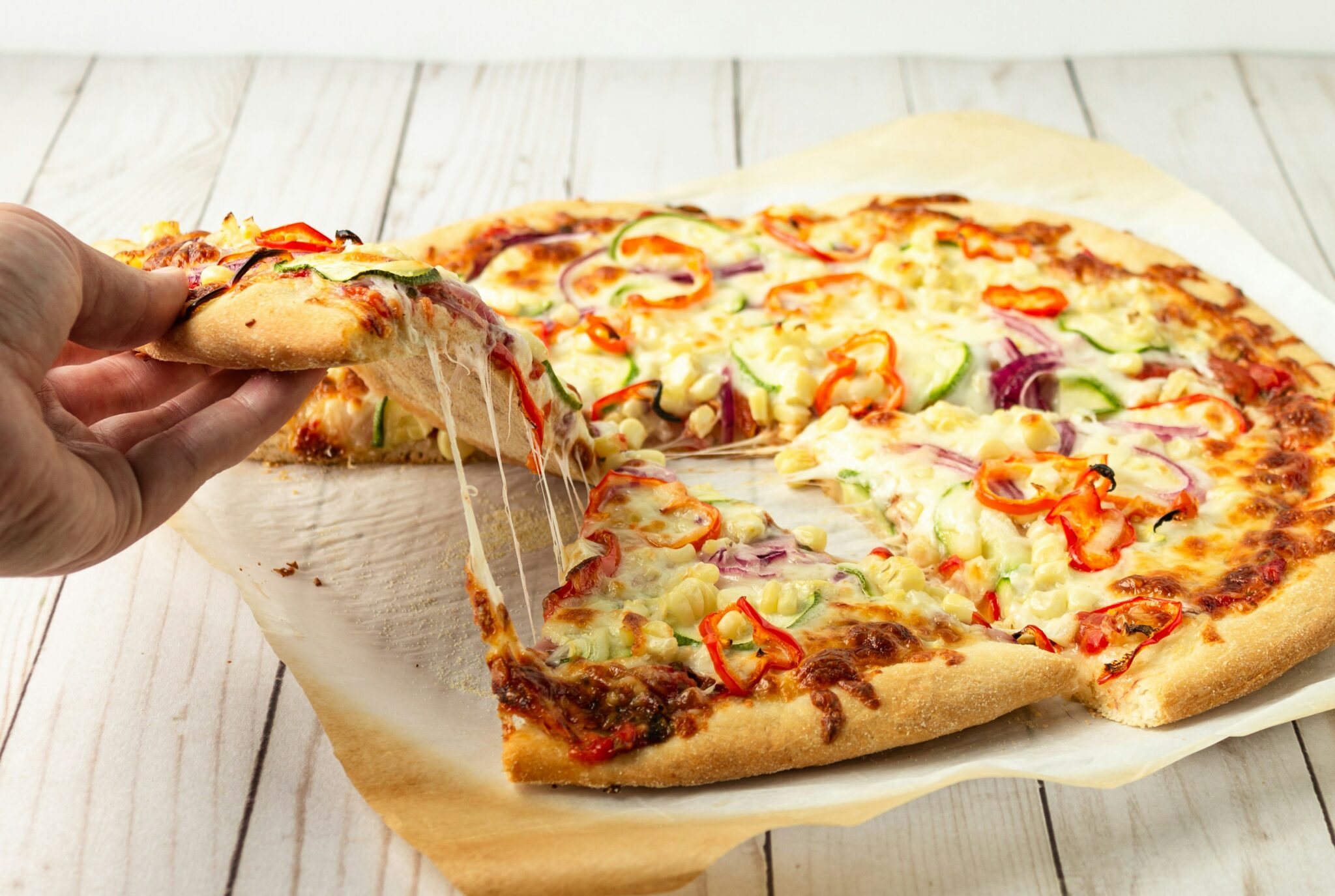 How Many Slices in a 16-Inch Pizza? 🍕